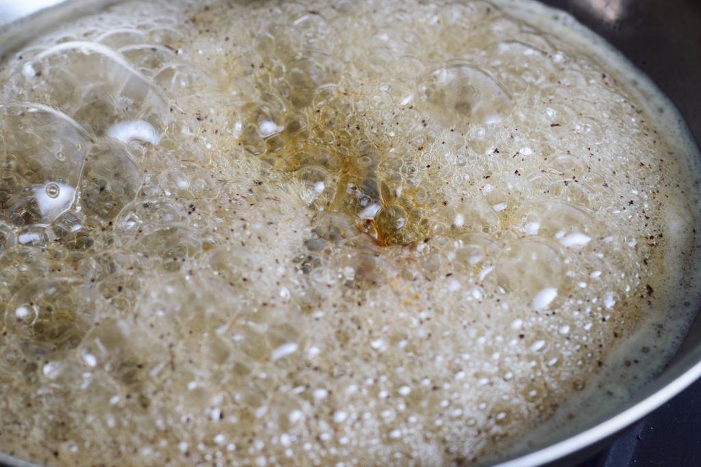 Bubbling brown butter with water added
