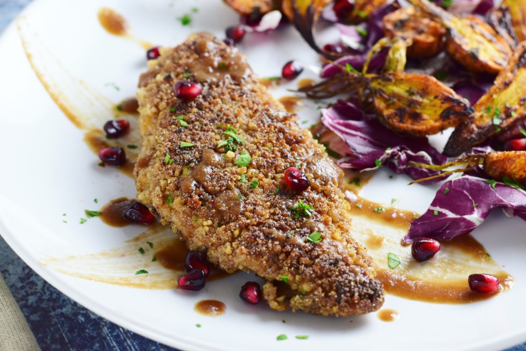 Walnut Crusted Chicken Breast with Pomegranate Sauce Plated