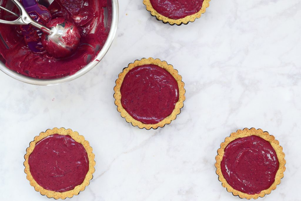 Almond Cookie Crusts Filled with Hibiscus Grapefruit Curd