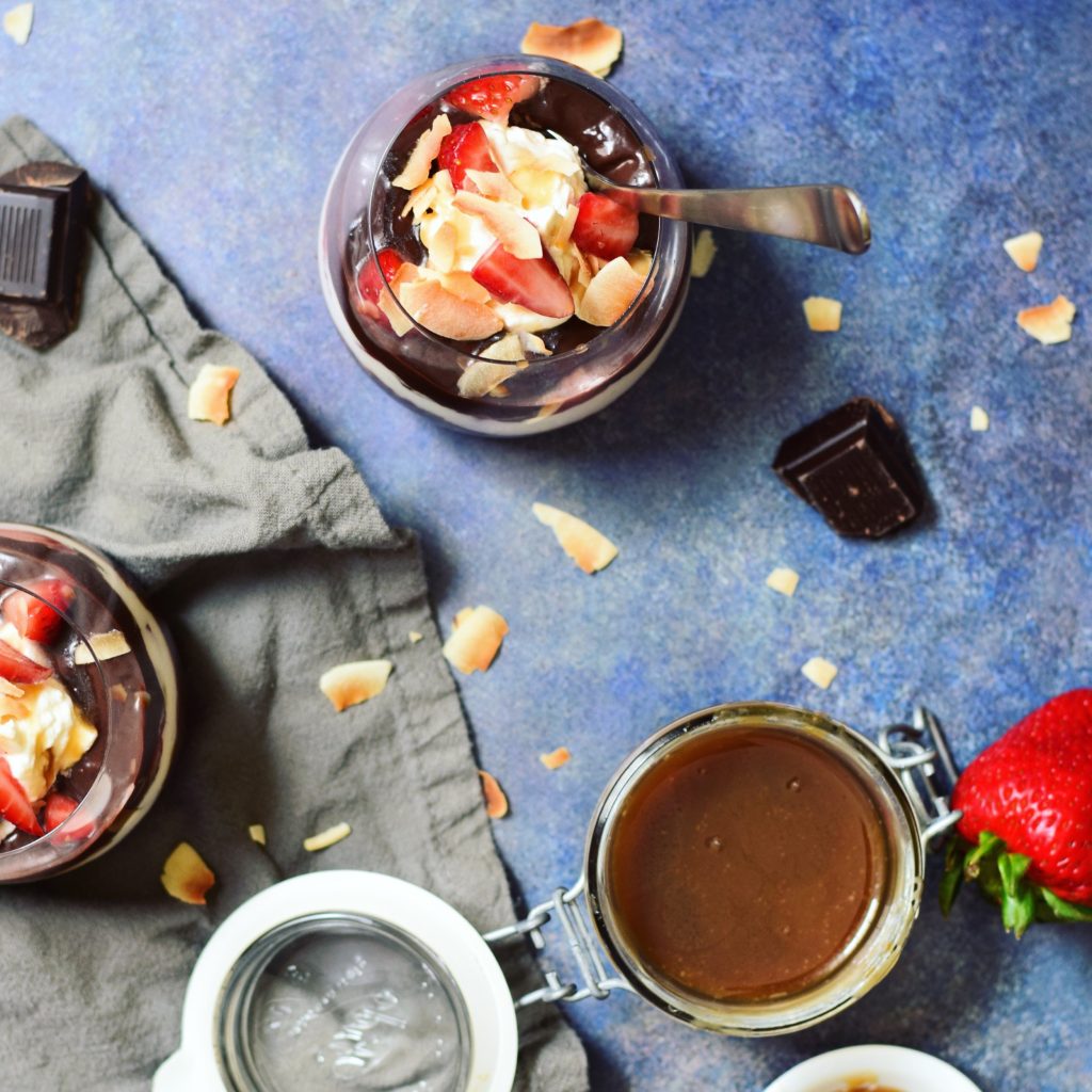Dark Chocolate Salted Caramel Pudding Parfaits with Macerated Strawberries Aerial
